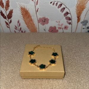 Elegant Gold and Green Clover Bracelet